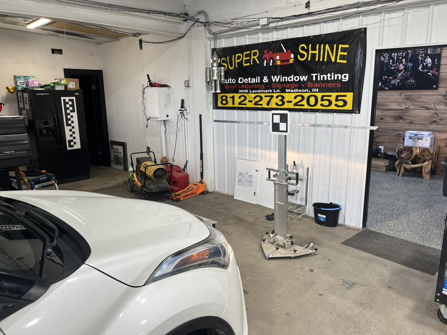 Radar calibration equipment and targets positioned for precision aiming at B-Rite Autoglass